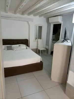 Letto o letti in una camera di Blusuite appartamento