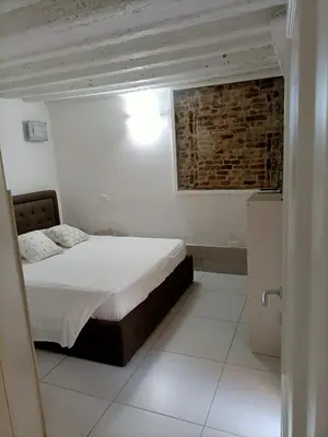 Letto o letti in una camera di Blusuite appartamento