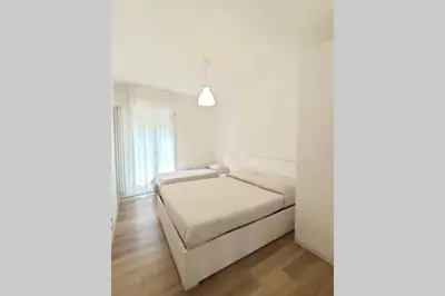 Letto o letti in una camera di DELTA D Piazza Marina- 50 MT dal mare - Immobil Relax