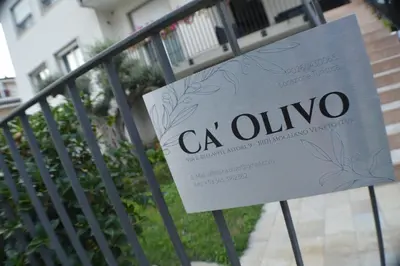 Certificato, attestato, insegna o altro documento esposto da Ca' Olivo