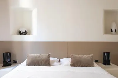 Letto o letti in una camera di Calle Teatro Vecchio - Venezia