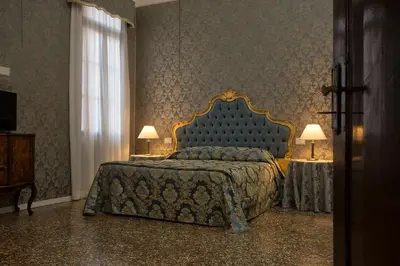 Letto o letti in una camera di palazzo suite ducale