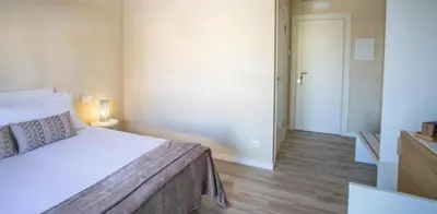 Letto o letti in una camera di Locanda GIOVI CA' DI PONTE