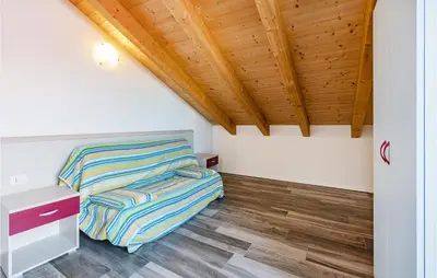 Letto o letti in una camera di Green Village