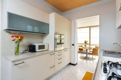 Cucina o angolo cottura di Appartamenti Casa De Lazzari - Piazza Brescia - Adria Holiday Jesolo - FAMILY APARTMENTS