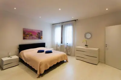 Letto o letti in una camera di Guglie