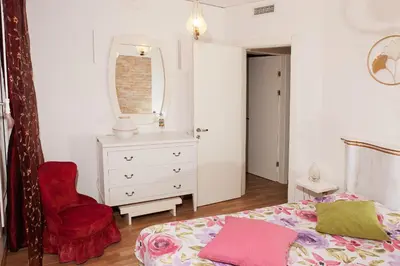 Letto o letti in una camera di Appartamento Piera Rossa