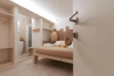Letto o letti in una camera di Laguna Suite B&B