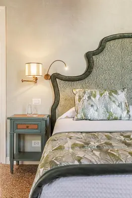 Letto o letti in una camera di L'Opera Divina- Dimora Italia -