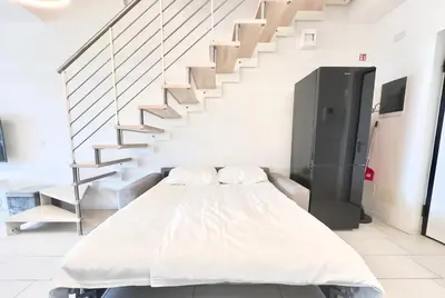 TV o dispositivi per l'intrattenimento presso Isola Blu Luxury Apartment