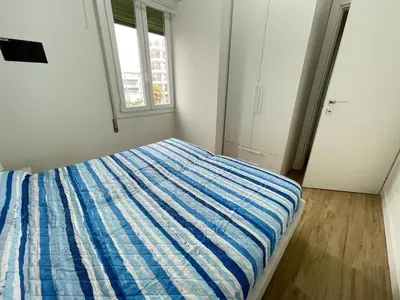 Letto o letti in una camera di CONDOMINIO ROSA- WALTERIGATO APARTMENTS-SOLO PER FAMIGLIE