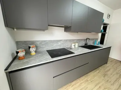 Cucina o angolo cottura di CONDOMINIO ROSA- WALTERIGATO APARTMENTS-SOLO PER FAMIGLIE