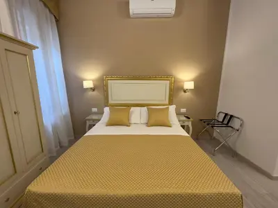 Letto o letti in una camera di Residenza Briati