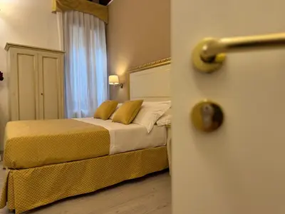 Letto o letti in una camera di Residenza Briati