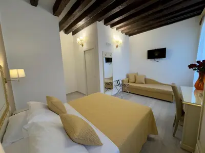 Letto o letti in una camera di Residenza Briati