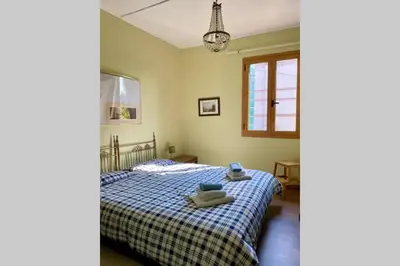 Letto o letti in una camera di Barchessa Ca’ Leon sul naviglio del Brenta