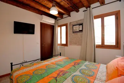 Letto o letti in una camera di Casa dea corte apartment