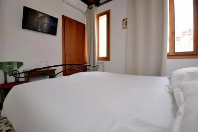Letto o letti in una camera di Casa dea corte apartment