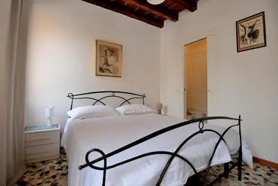 Letto o letti in una camera di Casa dea corte apartment
