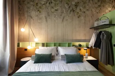 Letto o letti in una camera di Palazzo Pianca
