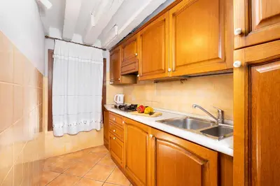 Cucina o angolo cottura di Appartamenti Superior in Via Garibaldi by Bricola Apartments