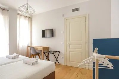Letto o letti in una camera di Treviso City Town 2