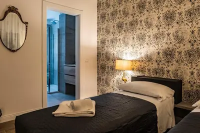 Letto o letti in una camera di Trevisi27