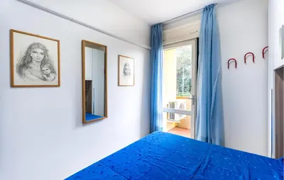 Letto o letti in una camera di Perla