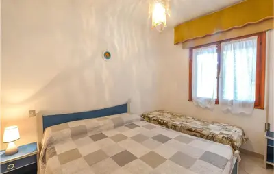Letto o letti in una camera di Villa Letizia 4