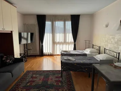 Letto o letti in una camera di OTB Italia 1 - Luminoso appartamento tra Venezia e Treviso con Terrazza e Posto auto Coperto