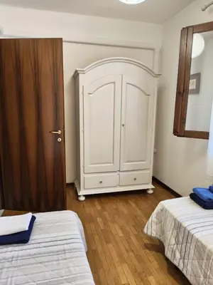 Letto o letti in una camera di Ortensia