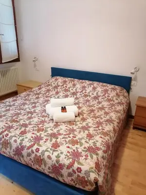 Letto o letti in una camera di Casa pergoletto