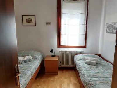Letto o letti in una camera di Casa pergoletto