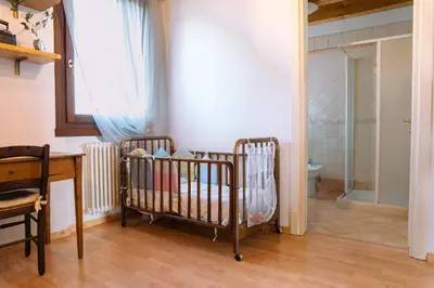 Letto o letti in una camera di Venice's neighbor Home