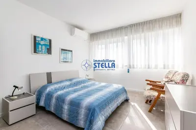 Letto o letti in una camera di Condomino Marina Marconi