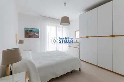 Letto o letti in una camera di Condomino Marina Marconi