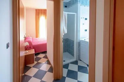 Letto o letti in una camera di Milan Residence
