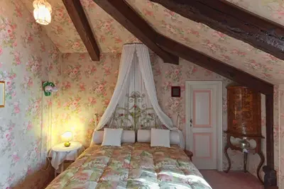 Letto o letti in una camera di Ca' Maddalena