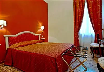 Letto o letti in una camera di Chandeliers Apartment