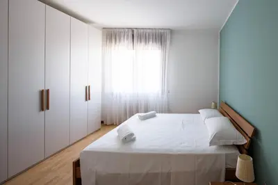 Letto o letti in una camera di Appartamento Calmo 2SX