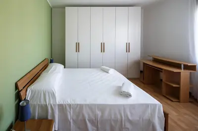 Letto o letti in una camera di Appartamento Calmo 2DX