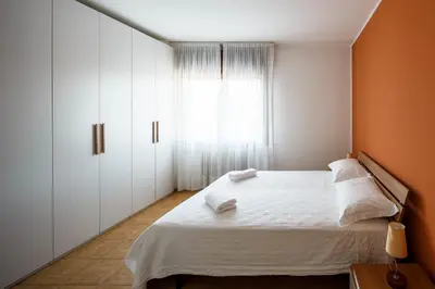 Letto o letti in una camera di Appartamento Calmo 3DX