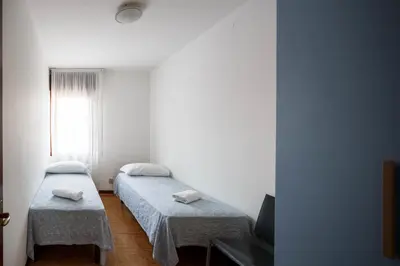 Letto o letti in una camera di Appartamento Calmo 3DX