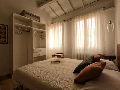 Letto o letti in una camera di Al Vecchio Porto
