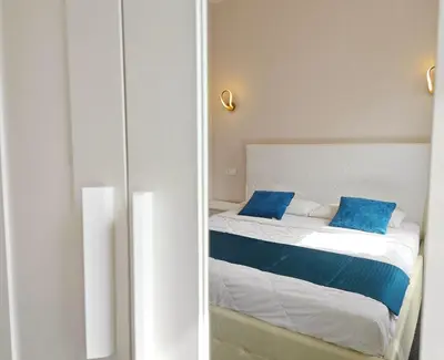 Letto o letti in una camera di Xixi B&B