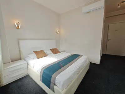 Letto o letti in una camera di Xixi B&B