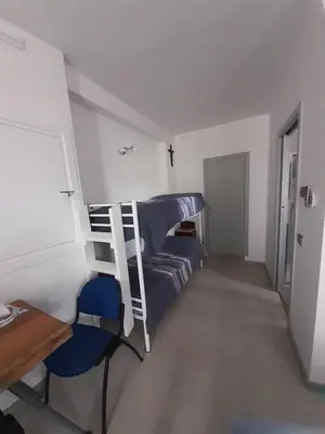 Letto o letti in una camera di Locazione turistica da Toio