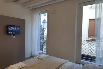 Letto o letti in una camera di Alla Crosera del Santo