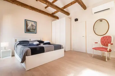 Letto o letti in una camera di Doge's Mirror & Stair @Frari