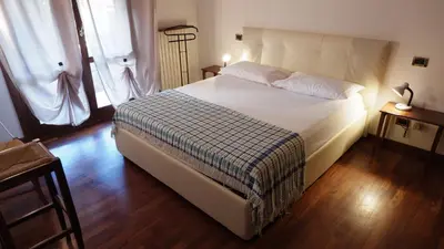 Letto o letti in una camera di App4rent - Appartamento Equilio - pet friendly - giardino esclusivo